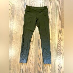 Lululemon Tight Stuff run tight size 4 dark green